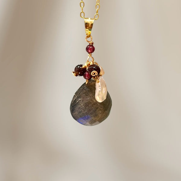 Lumière labradorite/garnet